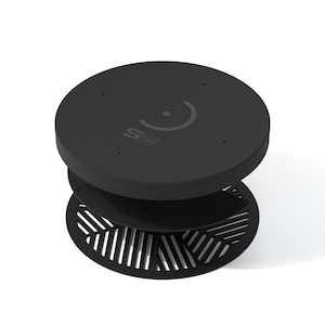 May include: A black, circular device with a layered design. The top layer has a curved symbol and the letters "SW". The middle layer is a solid black disc, and the bottom layer has a geometric pattern.