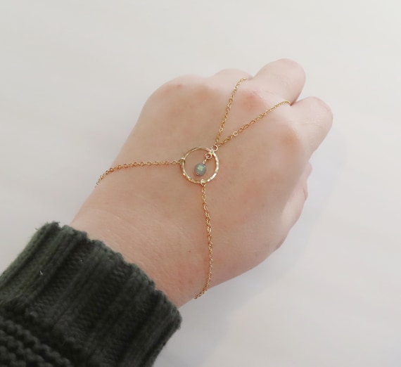 labradorite hand chain bracelet with hammered circle in gold filled with adjustable clasp, dainty chain ring connected to bracelet