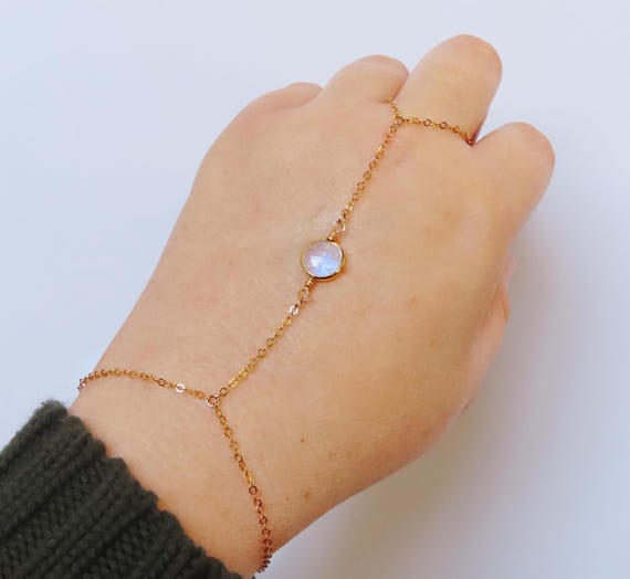 Moonstone hand chain bracelet in gold filled with adjustable clasp, dainty chain ring connected to bracelet, bracelet connected to ring