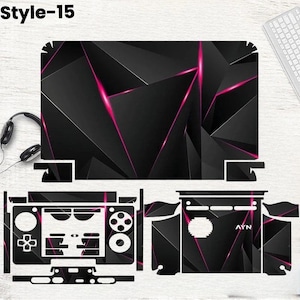 May include: Black and pink geometric design laptop skin and controller skins. The design features a series of black triangles with pink accent lines. The image also includes a keyboard, headphones, and the text "Style-15".