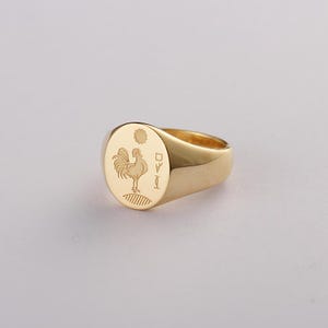 Pierścień z pieczęcią z pianiem koguta 18K ze złota, symbol Koguta św. Piotra