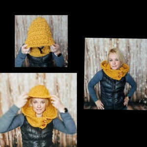 May include: A yellow crocheted hooded cowl with button accents. The cowl is worn by a person with a black vest and a wood background.
