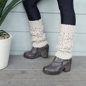 these are leg warmers that are light color over leggings.  they have a Lacey texture.