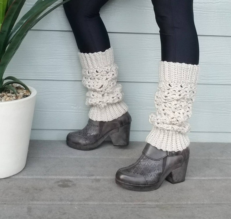 these are leg warmers that are light color over leggings.  they have a Lacey texture.