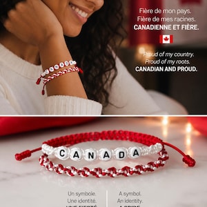 May include: Two braided bracelets in red and white cord. One bracelet features white spherical beads with black letters spelling CANADA. The other is a simple red and white braided cord. Both have adjustable sliding knots with red cord ends.