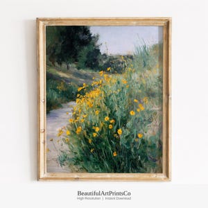 Pode incluir: Uma impressão de pintura a óleo emoldurada apresentando uma paisagem com um caminho de terra que serpenteia por um campo de flores silvestres amarelas vibrantes e grama verde alta, sob árvores verde-escuras e um céu pálido. Texto: BeautifulArtPrintsCo.