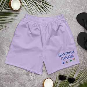 MONTRÉAL CANADA  Heritage Symbol Print Athletic Light Purple Fog Long Shorts by Alter Standard | Eco friendly Unisex Long Shorts