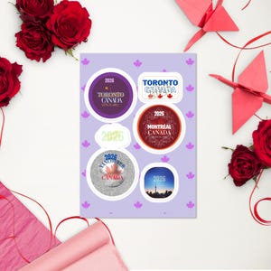 May include: A sticker sheet featuring a light purple background with small maple leaf patterns. It includes five distinct stickers with Canadian city themes, including Toronto, Montreal, and Vancouver, all displaying the year 2026 in various fonts.