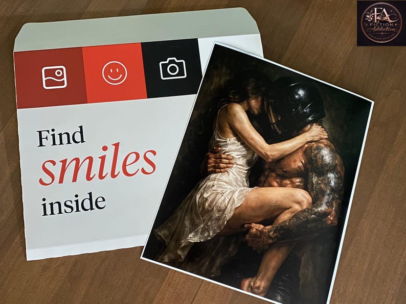 May include: A white envelope with red and black accents, featuring icons and the text "Find smiles inside." Beside it, a print depicts a couple embracing, with one wearing a helmet and the other in a white dress.