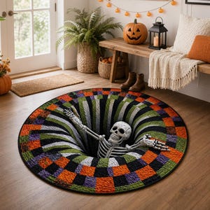 May include: A round area rug featuring a 3D optical illusion of a deep, dark hole with a skeleton emerging from the center. The rug has a checkered pattern in shades of orange, purple, green, and black, creating a vortex effect on the floor.