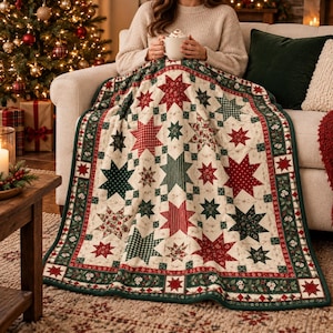 May include: A quilt featuring a repeating star pattern in shades of red, green, and cream. The fabric blocks display various prints including polka dots, stripes, and floral motifs, finished with a dark green border with white floral accents.