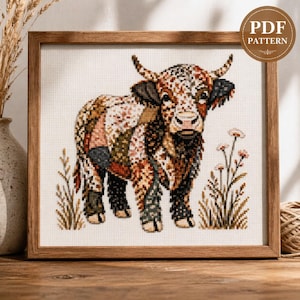 May include: Cross-stitch pattern of a Highland cow in a wooden frame. The artwork features a detailed design with brown, tan, and black colours. The image includes the text "PDF PATTERN" in a circular design.