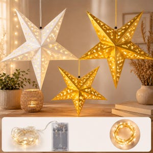 May include: Three hanging star-shaped lanterns featuring intricate cutouts of stars and crescent moons. One lantern is white, and two are gold. The set includes a battery-operated string of warm white LED lights with a clear plastic battery pack.