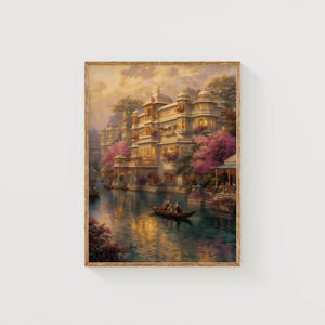 May include: A framed art print depicts a serene waterside scene. A large, ornate building with multiple levels and warm lighting sits along the water's edge. A small boat with people floats on the water, and pink flowering trees add color.