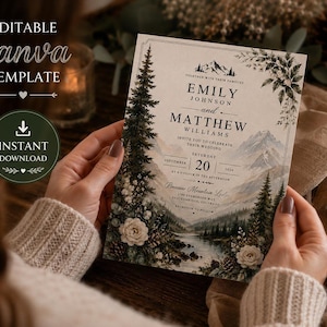 May include: A rectangular wedding invitation card featuring a mountain landscape illustration with pine trees, white flowers, and a lake. The text reads: Emily Johnson and Matthew Williams, invite you to celebrate their wedding, Saturday September 20 2026.