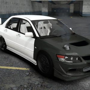May include: A two-tone white and dark green Mitsubishi Lancer Evolution sports car parked in a parking lot. The car has black wheels, a rear spoiler, and a custom front bumper.