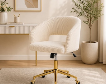 Sillón auxiliar tapizado en terciopelo capitoné, sillón moderno tapizado con patas doradas.