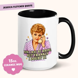 May include: A white ceramic mug with a black interior and handle. The mug features a portrait of a woman on the front, with the quote "NOW, I MAY BE WRONG, BUT FRANKLY I DOUBT IT." The mug is 444 ml.