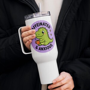 Caffeinated & Anxious Travel Mug with Handle | Cute Dinosaur Tumbler | Stanley Style Cup | Funny Mental Health Gift | Anxiety Coffee Mug