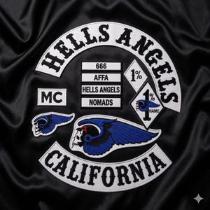 May include: A collection of embroidered patches featuring the text Hells Angels, California, MC, 666, AFFA, Nomads, and 1%. The patches include a skull with blue wings, a diamond-shaped 1% patch, and a smaller skull with blue wings on a black fabric.
