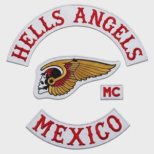 May include: Embroidered patches featuring the Hells Angels logo. The patches include a skull with wings, the words "HELLS ANGELS" and "MEXICO" in red on white, and a small "MC" patch.