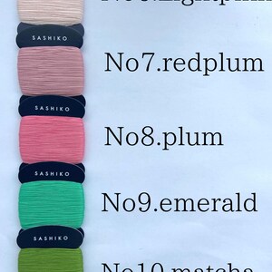 May include: Five rectangular cards of Sashiko thread in light pink, red plum, plum, emerald, and matcha green. Each card is labeled with its color name and number, from No6 to No10. The bottom card specifies 100% cotton and 40m length.