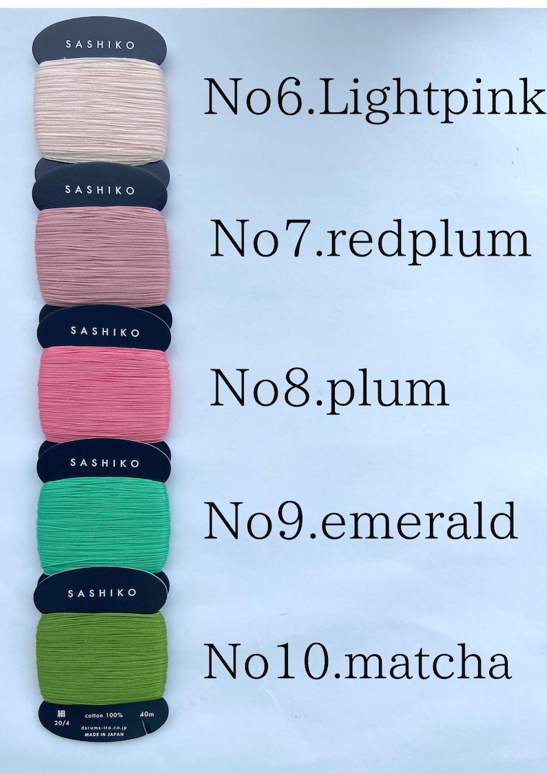 May include: Five rectangular cards of Sashiko thread in light pink, red plum, plum, emerald, and matcha green. Each card is labeled with its color name and number, from No6 to No10. The bottom card specifies 100% cotton and 40m length.