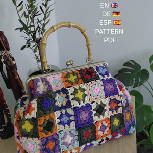 May include: A handbag constructed from multicolored crocheted granny squares featuring a bamboo handle and a metallic kiss-lock frame. The bag displays text reading EN, DE, ESP, PATTERN, PDF. The design incorporates various yarn colors including orange, purple, blue, green, and pink.