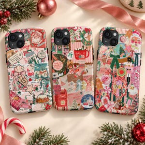 May include: Three smartphone cases featuring a collage of Christmas-themed illustrations including Santa Claus, nutcrackers, gingerbread men, mailboxes, gift boxes, and festive greenery. Each case has a dual-camera cutout on the upper left corner.