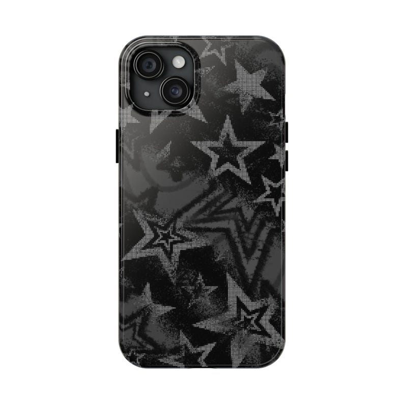 May include: A black smartphone case featuring a repeating pattern of distressed, textured stars in varying shades of grey and white. The design covers the entire back surface, including the area around the circular camera lens module.