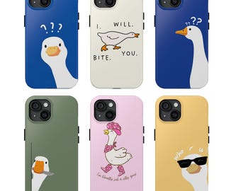 May include: A collection of six phone cases with goose-themed designs. The cases feature various colors, including blue, white, green, pink, and yellow. Each case has a unique goose illustration with text such as "I will bite you" and "Peace was never an option."