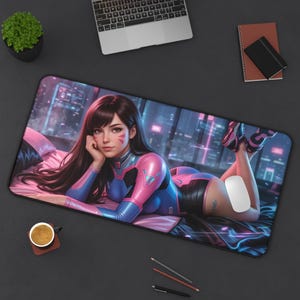 May include: A large rectangular mouse pad featuring a digital illustration of a woman in a pink and blue outfit, lying down. The background shows a cityscape with neon lights. A white computer mouse is on the pad.