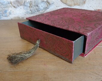 Pink fabric covered box with metallic flower pattern, French hosiery stocking storage drawer