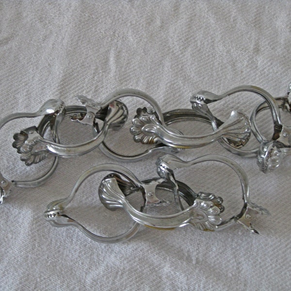 Large French silver curtain clips