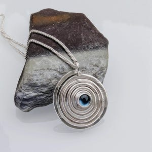 Recycled Sterling Silver Spiral Topaz pendant. Made in my Workshop in Scotland Alba Cara Jewellery