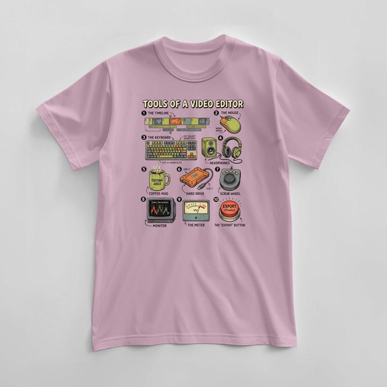 May include: A light pink t-shirt featuring a graphic of video editing tools. The design includes a timeline, keyboard, mouse, headphones, coffee mug, hard drive, monitor, meter, and an "export" button. The text "TOOLS OF A VIDEO EDITOR" is at the top.