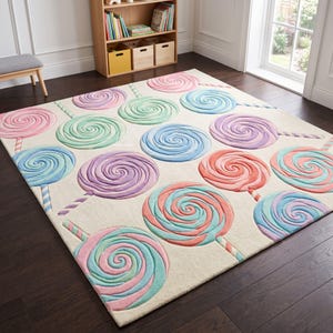 May include: A rectangular area rug featuring a repeating pattern of swirled lollipops in pastel shades of pink, blue, purple, and mint green against a cream-colored background. Each lollipop includes a striped stick extending from the circular candy.