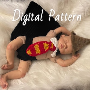 May include: A crochet baby outfit with a black and red tie, a brown hat, and the text "Digital Pattern".