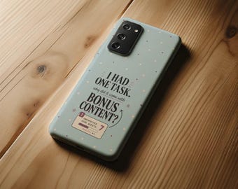May include: A light blue smartphone case featuring a scattered pattern of small dots and stars. The text reads: I HAD ONE TASK. why did it come with BONUS CONTENT? Below the text is a rectangular graphic labelled UNEXPECTED SIDE QUESTS: 7.