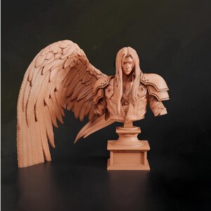 May include: A monochromatic terracotta-colored resin bust of a long-haired figure with a single large feathered wing extending from the back. The figure wears layered shoulder armor and a jacket, mounted on a square pedestal base with a smooth finish.