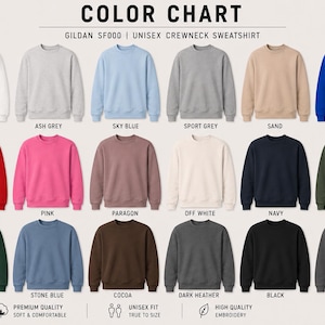 May include: A color chart for Gildan SF000 unisex crewneck sweatshirts, displaying eighteen solid color options including white, ash grey, sky blue, sport grey, sand, royal blue, red, pink, paragon, off white, navy, military green, forest green, stone blue, cocoa, dark heather, black, and charcoal.