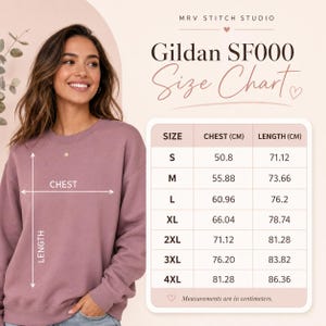 May include: A mauve crewneck sweatshirt with a size chart titled MRV STITCH STUDIO Gildan SF000 Size Chart. The chart lists sizes S through 4XL with chest and length measurements in centimeters, ranging from 50.8 cm to 86.36 cm for reference.