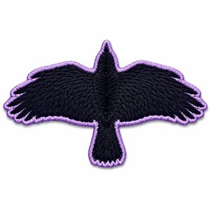 May include: Embroidered patch featuring a black raven in flight, with outstretched wings and a purple border. The raven's feathers are detailed, and the patch is designed to be sewn or ironed onto fabric. Ideal for jackets, bags, or other apparel.