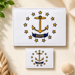 May include: Two rectangular white embroidered patches featuring the Rhode Island state flag design. Each patch displays a gold anchor centered within a circle of thirteen gold stars, with a blue ribbon below the anchor containing the word HOPE.