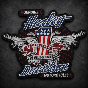 May include: A black Harley-Davidson patch with the words "Genuine" and "Motorcycles". The patch features a number one with red and white stripes and blue stars, wings, and the words "Established 1903".