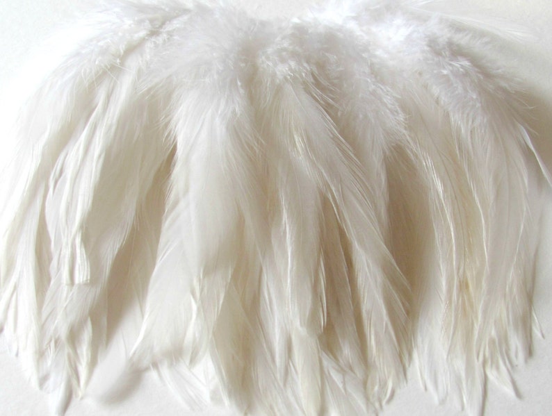 35 - 40 Strung Rooster Schlappen Hackle Feathers - White 