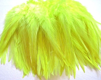 40 Strung Rooster Hackle Feathers - Fluorescent Yellow (6 - 8 inches)