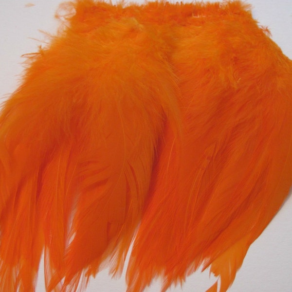 40 Strung Rooster Saddle Hackle Feathers - Orange (5 - 8 inches)