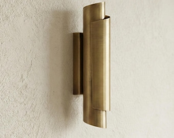 Handcrafted Raw Brass Wall Sconce: Mid-Century Modern Ambient Light Fixture
