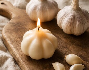 Candela decorativa a forma di aglio e verdura per la cucina.